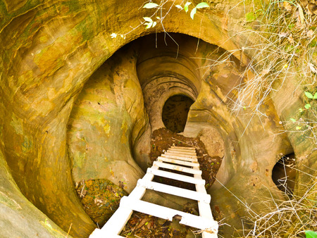 Amazing stone hole the hole is like a pot, is a natural hole in the hole is the largest group in Thailand. There are no less than 16 holes with many sizes ranging from 40 cm wide mouth  30 meters deepの写真素材