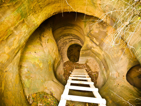 Amazing stone hole the hole is like a pot, is a natural hole in the hole is the largest group in Thailand. There are no less than 16 holes with many sizes ranging from 40 cm wide mouth  30 meters deepの写真素材