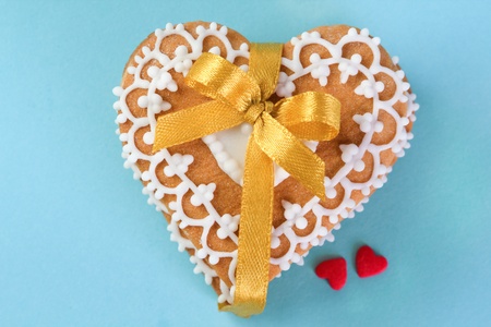 Valentine cookies tired with yellow ribbonの写真素材