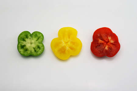 isolated red green yellow sweet pepperの写真素材