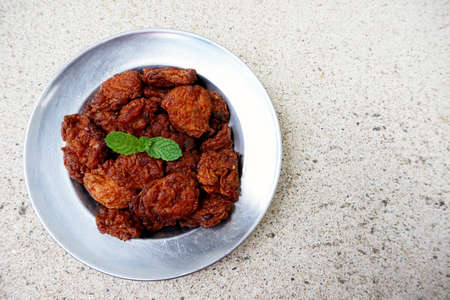 spicy curry fried fish patty made from fish mix with curry pasteの写真素材