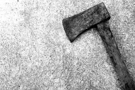 black and white iron axe with wood handleの写真素材