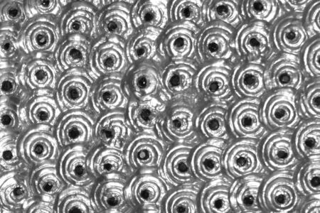 abstract of black and white tiny round stucco art