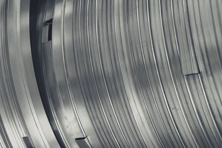 abstract stack of metal and stainless steel curveの写真素材
