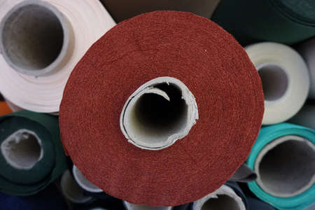 abstract stack of fabric roll in the factoryの写真素材