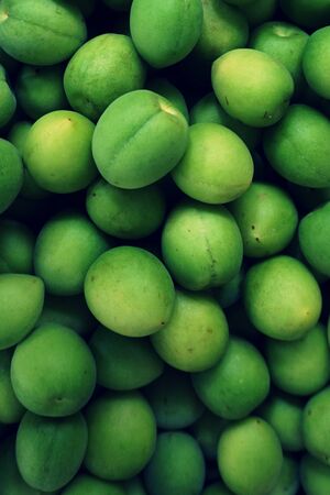 close up group of green plum fruitsの写真素材