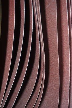 abstract close up of brown sandpaper beltの写真素材