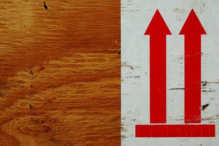 abstract of red up sign on the wood boardの写真素材
