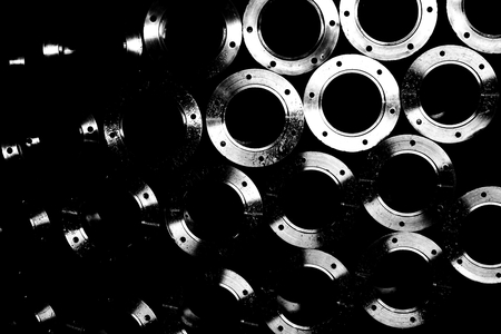 black and white abstract stack of round metal partsの写真素材