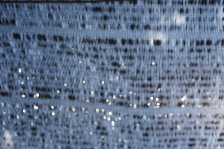 blurred of nylon net under the sky for background usedの写真素材