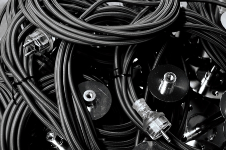 abstract group of black electric wires on floorの写真素材