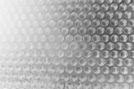 abstract of round metal mesh texture for background usedの写真素材