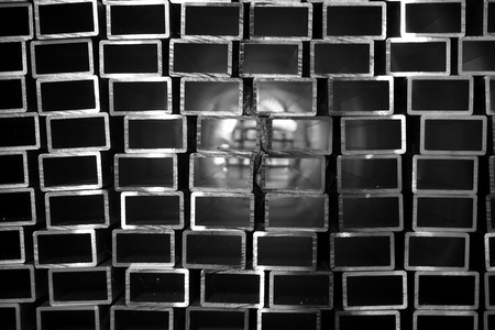 stack of square stainless steel tube in warehouse