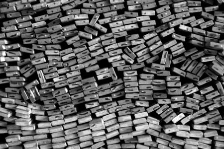 grop of metal stock with different size in warehouseの写真素材