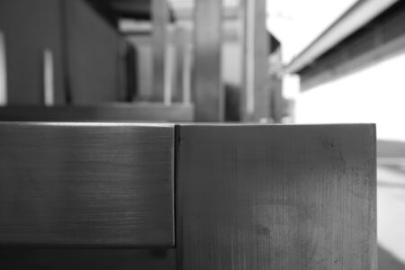 stack of square stainless steel tube in warehouseの写真素材