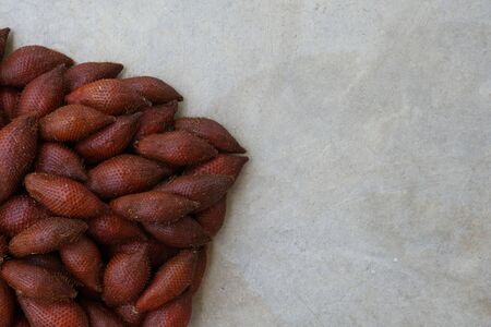 group of Salacca zalacca fruits are the favorite in tropical eating fruit with sweet in testの写真素材