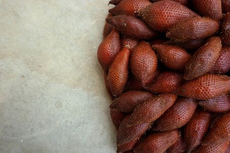 group of Salacca zalacca fruits are the favorite in tropical eating fruit with sweet in testの写真素材