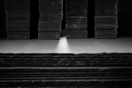 stack of corrugated paper in the warehouseの写真素材
