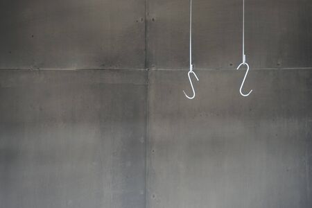 hanging of hook from the conveyor in manufactoringの写真素材