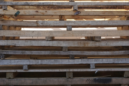 stack of wood pallets in the factory for backgroud usedの写真素材