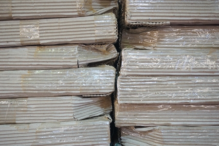 stack of carton boxes ready for shipment in factoryの写真素材