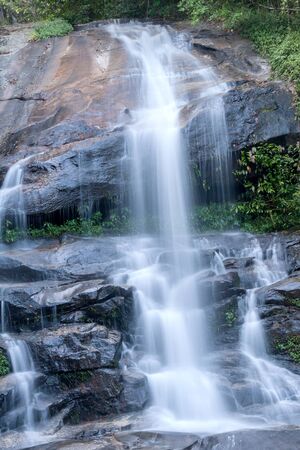 A waterfall in Chiangmai, Thailand.の写真素材
