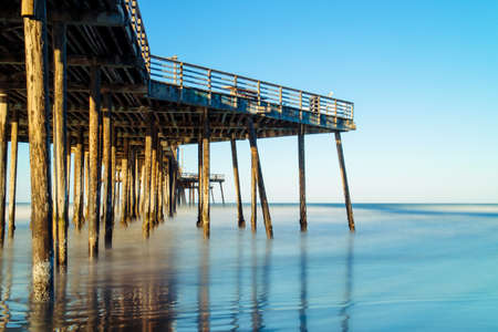 Old pier on the beach,Pismo beach, CA, USA.の写真素材