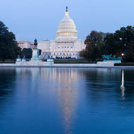 The United States Capitol, seen from the the Capitol Reflecting Pool, Washington DC, USA.の写真素材