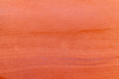 Rough red rock texture background.の写真素材