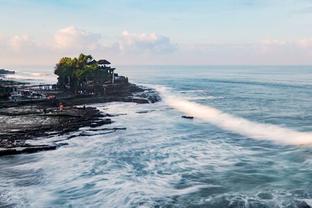 Tanah Lot & Batu Bolong temple. Long exposure effect, Bali Indonesia. Tropical nature landscape of Indonesia, Bali.の写真素材