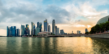 Singapore business district skyline during sunset. Group of skyscrapers at Marina Bay, Singapore.の写真素材
