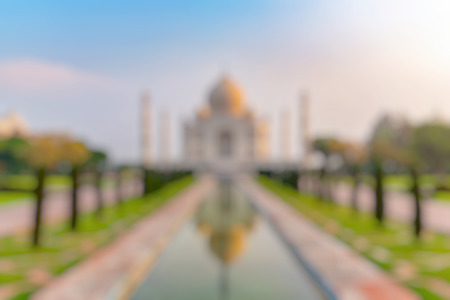 Out of focus of Taj Mahal front view reflected on the reflection pool, an ivory-white marble mausoleum on the south bank of the Yamuna river in Agra, Uttar Pradesh, India. One of the seven wonders of the world.の写真素材