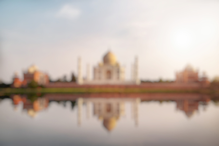 Out of Focus of Taj Mahal seen from Mehtab Bagh reflect on Yamuna river, an ivory-white marble mausoleum on the south bank of the Yamuna river in Agra, Uttar Pradesh, India.の写真素材