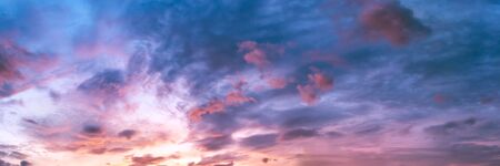 Dramatic panorama sky with cloud on sunrise and sunset time. Panoramic image.の写真素材