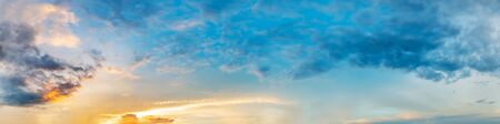 Dramatic panorama sky with cloud on sunrise and sunset time. Panoramic image.の写真素材