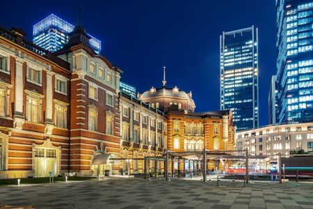 Tokyo city skyline at railway station surround by modern highrise building at twilight time.  Tokyo...