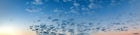 Panorama of Dramatic vibrant color with beautiful cloud of sunrise and sunset. Panoramic image.