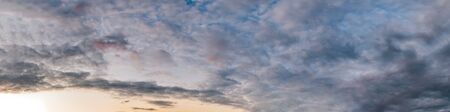 Dramatic panorama sky with storm cloud on a cloudy day. Panoramic image.の写真素材