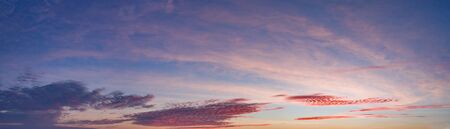 Panorama of Dramatic vibrant color with beautiful cloud of sunrise and sunset. Panoramic image.の写真素材
