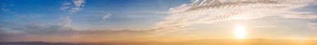 Panorama of Dramatic vibrant color with beautiful cloud of sunrise and sunset. Panoramic image.の写真素材