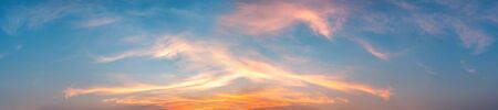 Panorama of Dramatic vibrant color with beautiful cloud of sunrise and sunset. Panoramic image.の写真素材