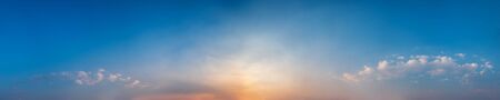 Panorama of Dramatic vibrant color with beautiful cloud of sunrise and sunset. Panoramic image.の写真素材