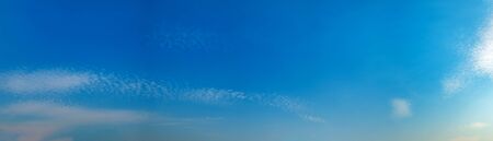 Panorama sky with beautiful cloud on a sunny day. Panoramic high resolution image.の写真素材