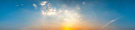 Panorama of Dramatic vibrant color with beautiful cloud of sunrise and sunset. Panoramic image.の写真素材