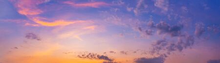 Twilight panorama sky background with colorful cloud in dusk. Panoramic image.の写真素材