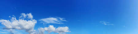 Panorama sky with beautiful cloud on a sunny day. Panoramic high resolution image.