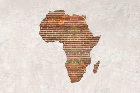 Africa map on antique brick wall texture background.の写真素材