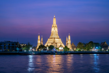 Pagoda at Wat Arun, a royal temple at Chaopraya river on twilight time, Bangkok, Thailand.の写真素材