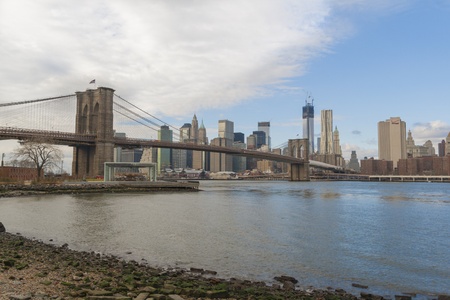 Downtown Manhattan, Brooklyn bridge and new WTC buildingsのeditorial素材