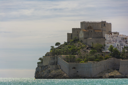 The castle of Peniscola,  located on Costa del Azahar in Spain. This popular tourist destination is located on a rocky headland.のeditorial素材